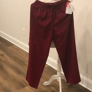 Scrub Pants/ Burgundy /Wine color. Size L but fits like a .medium. Brand New.